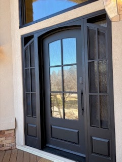 Iron door with sidelights