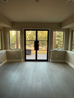 Arched iron door with transom and sidelights