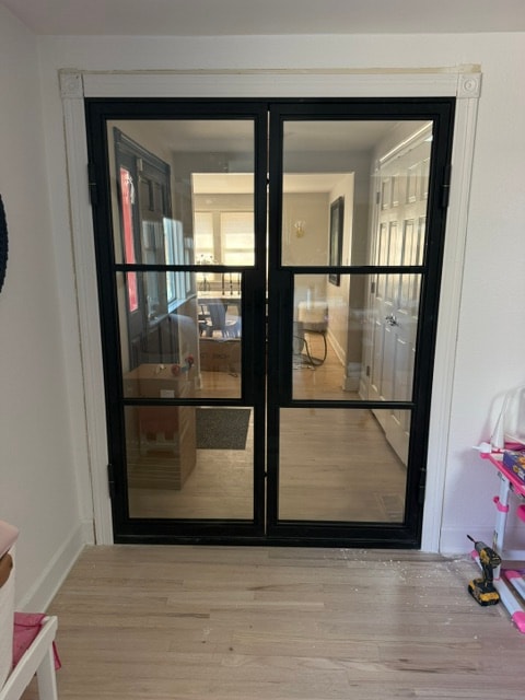Black iron double doors interior installation