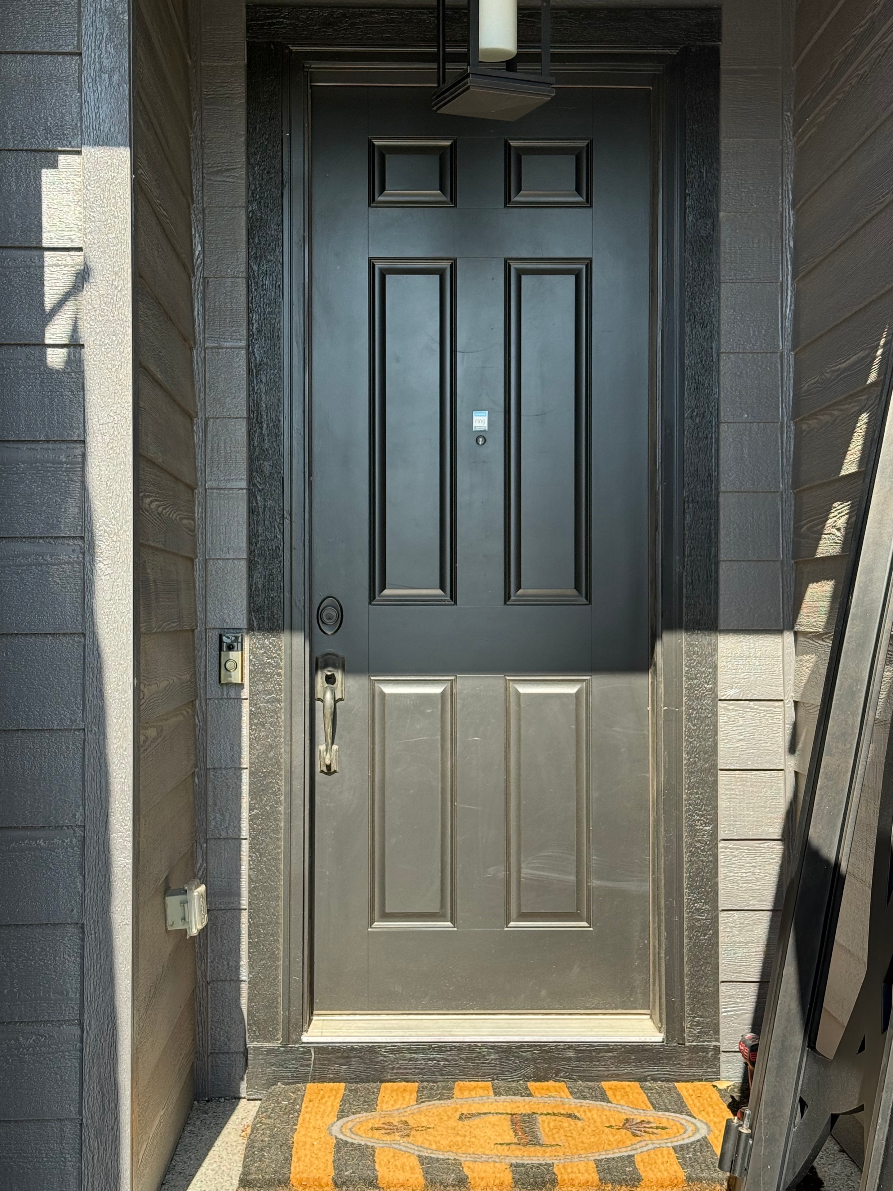 Before — original entry door prior to Colorado Iron Door installation