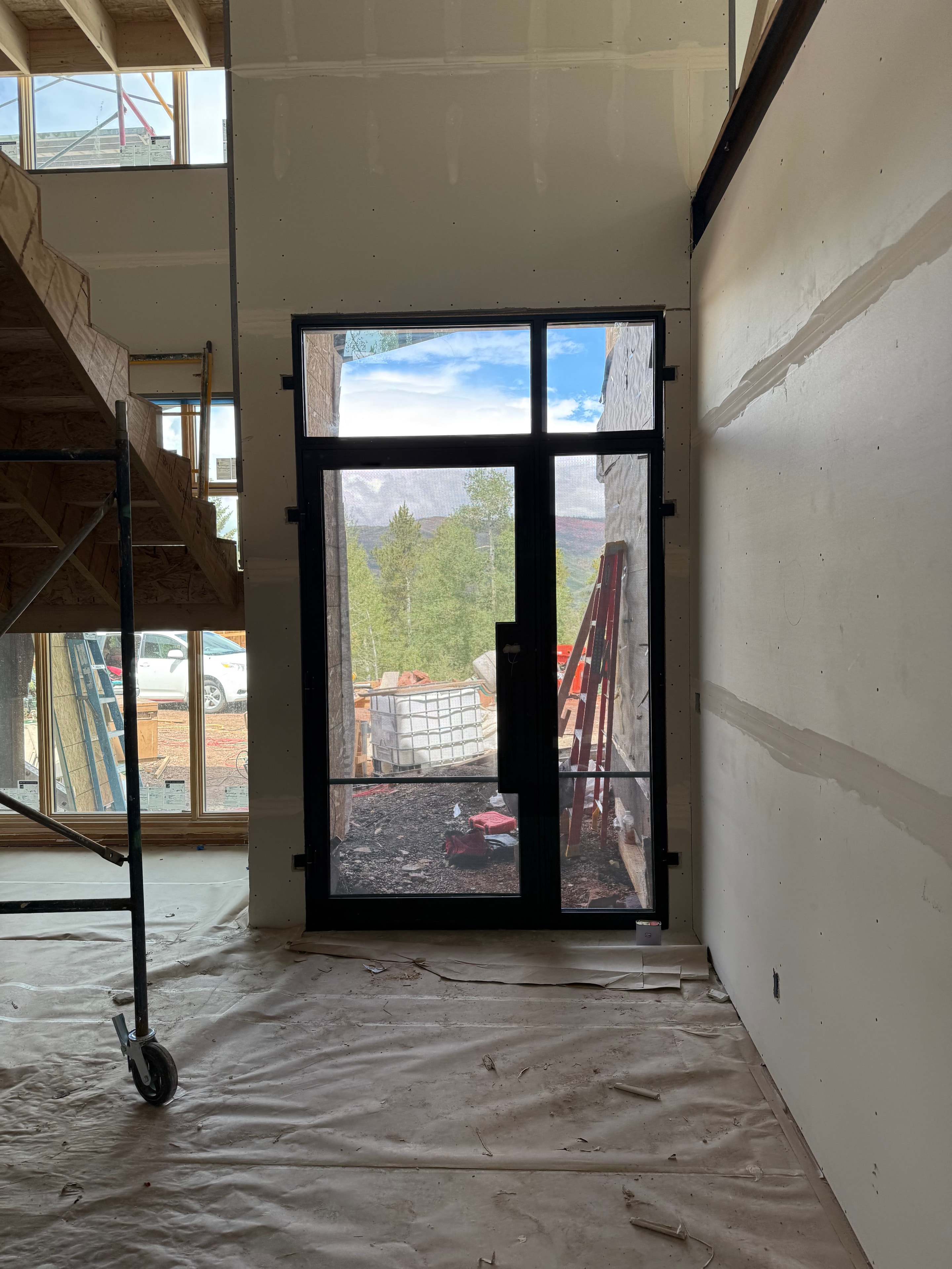 Large iron window unit with glass panels, interior view